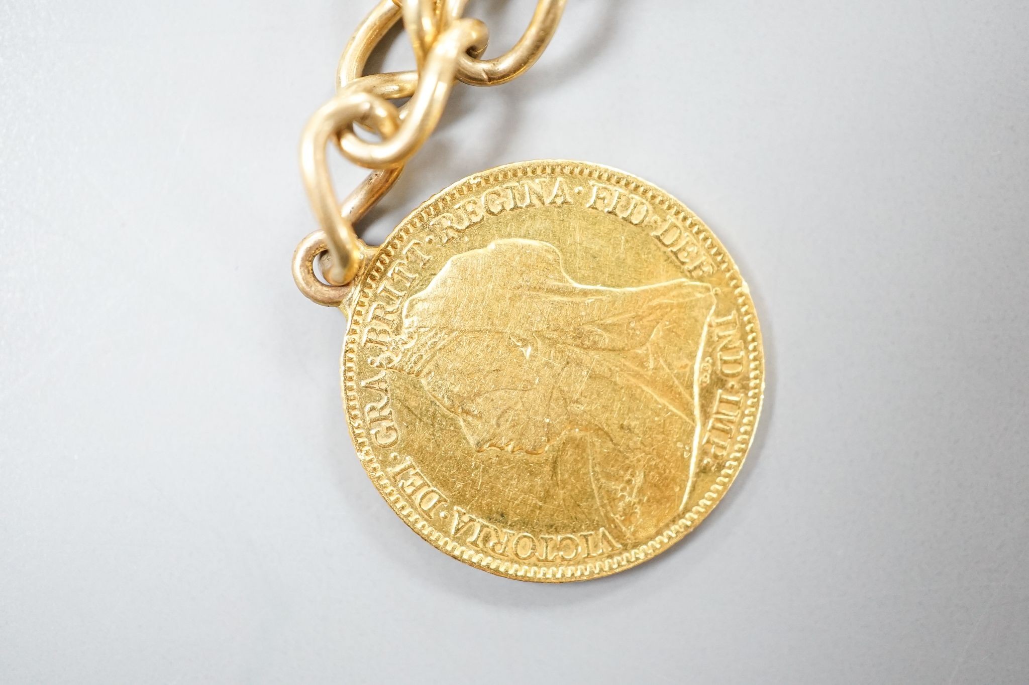 An 1896 gold half sovereign, mounted on a 9ct gold bracelet, gross 12.1 grams.